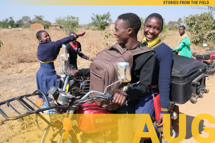 Kuwala Going Mobile with student on the back of the parent's motorbike