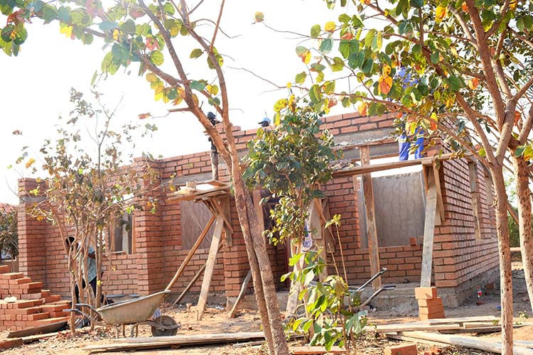 Kuwala second staff house construction with walls going up.