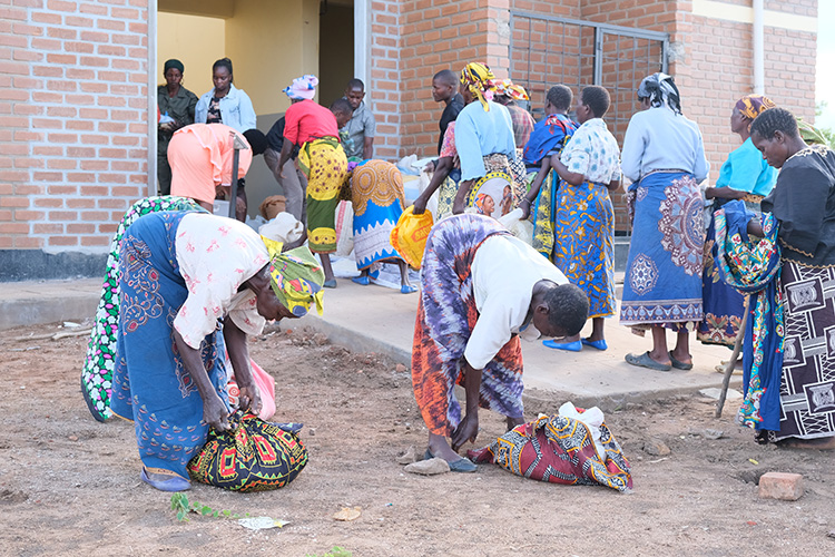 Village elders packing up Christmas hampers.