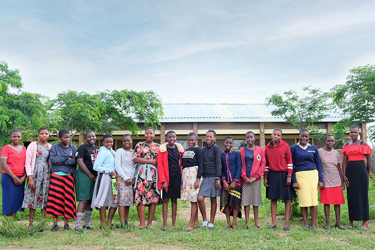 Kuwala students in front of Classroom block. 