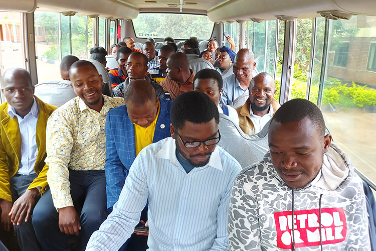 Kuwala teachers group photo inside the tour bus.